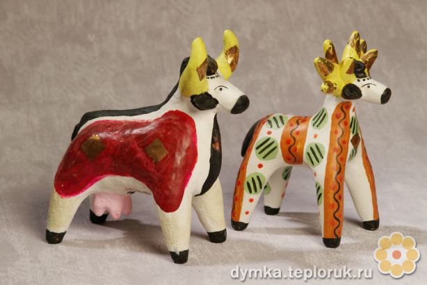 Дымковская игрушка "Корова и олень"
