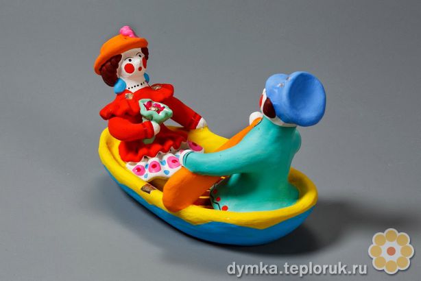 Дымковская игрушка "Парочка в лодочке"