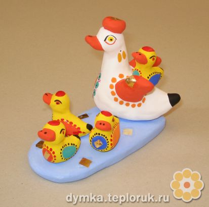 Дымковская игрушка "Утка с утятами"